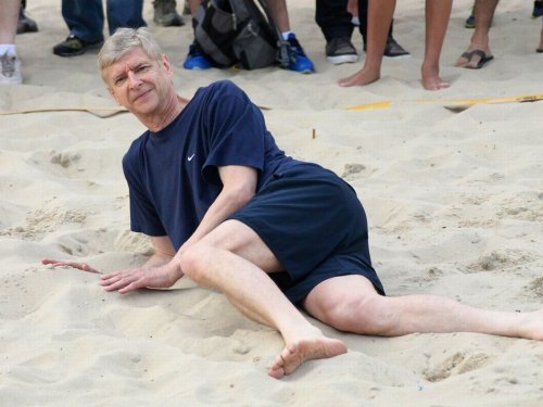 Arsene-Wenger-lays-in-the-sand-whilst-playing-a-game-of-footvolley-on-the-beach-in-Ipanema.jpg